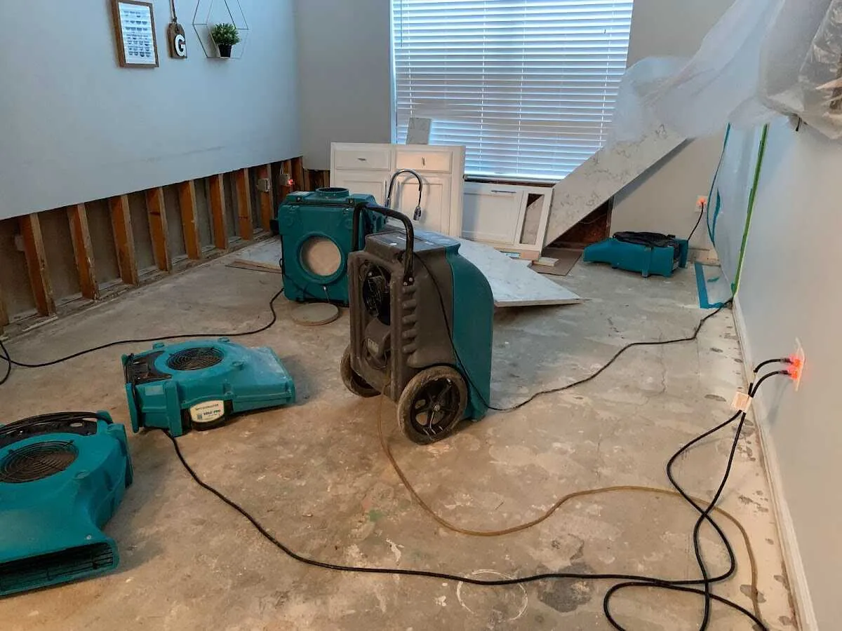 Dehumidifier in flood-cut room for Water Damage Restoration in Alpena